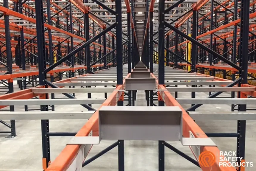 Flue Guards holding the flue space open between back-to-back pallet rack rows